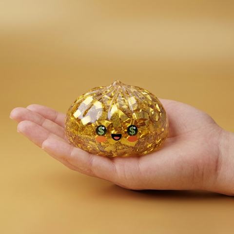 Gold Dumpling Squishy Kultainen Harvinaisuus kädessä, todellinen koko