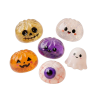 Dumpling Squishy Halloween Set de 5 puristettuna kädessä