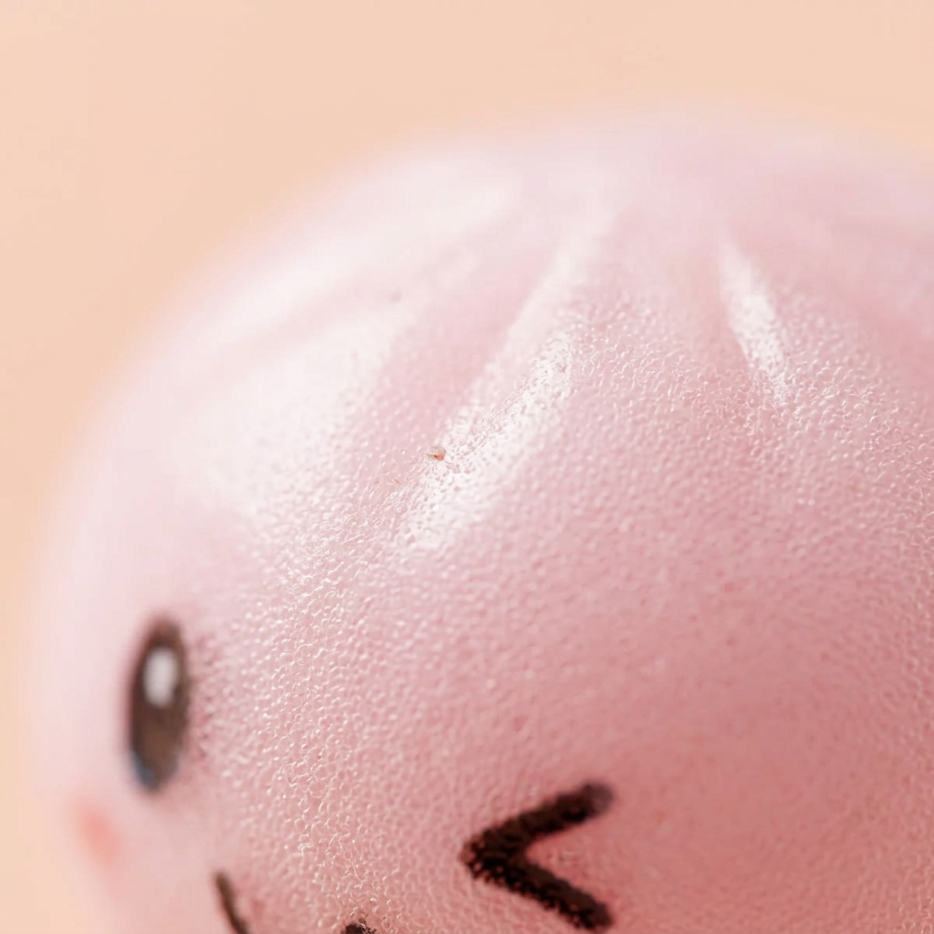 Dumpling Squishy Avaimenperäsetti 6 kpl — makrolähikuva tekstuurista
