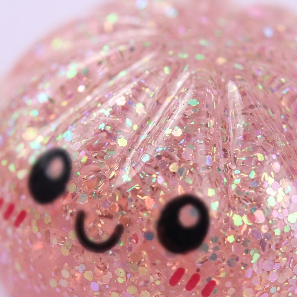 Dumplings Squishy Glitter -yllätyspakkaus makrokuva vaahdon pinnasta