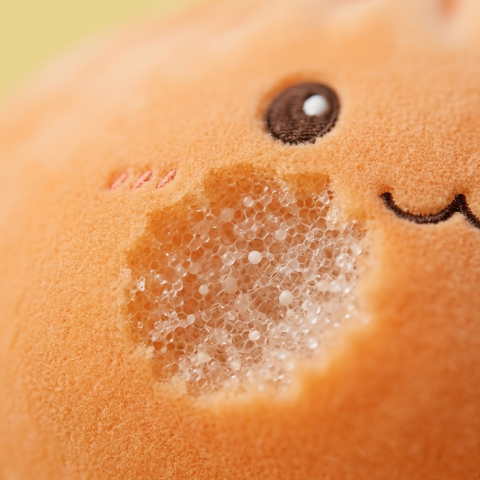 Giant Dumpling Squishy Oranssi XXL makrokuva vaahdon pinnasta
