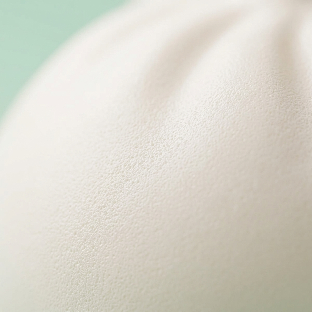 Giant Dumpling Squishy Pilvenvalkoinen — makrolähikuva tekstuurista