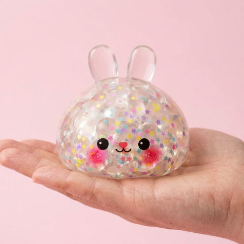Bunny Dumpling Squishy Konfetti kädessä — kokovertailu