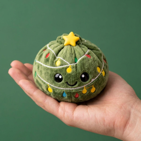 Dumpling Squishy Joulukuusi Kimalteleva kädessä — kokovertailu