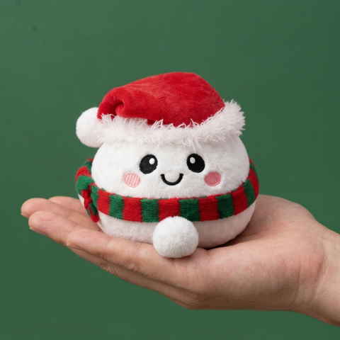Dumpling Squishy Lumiukko Joulupipossa kädessä — kokovertailu