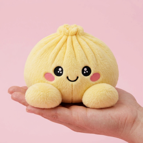Dumpling Squishy Sitruunankeltainen kädessä — kokovertailu